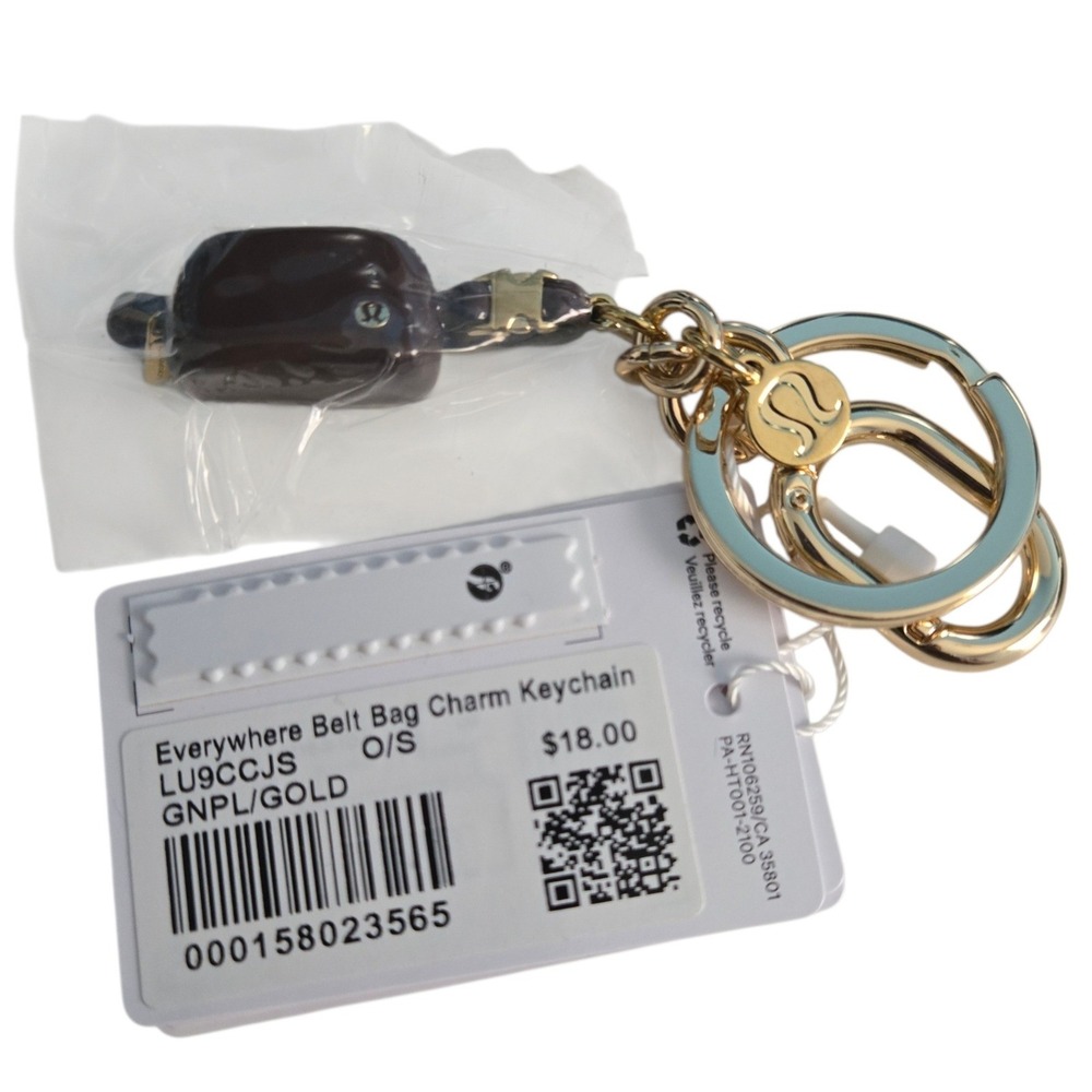 Lululemon Everywhere Belt Bag Charm Keychain Grape Thistle Gold LU9CCJS NWT